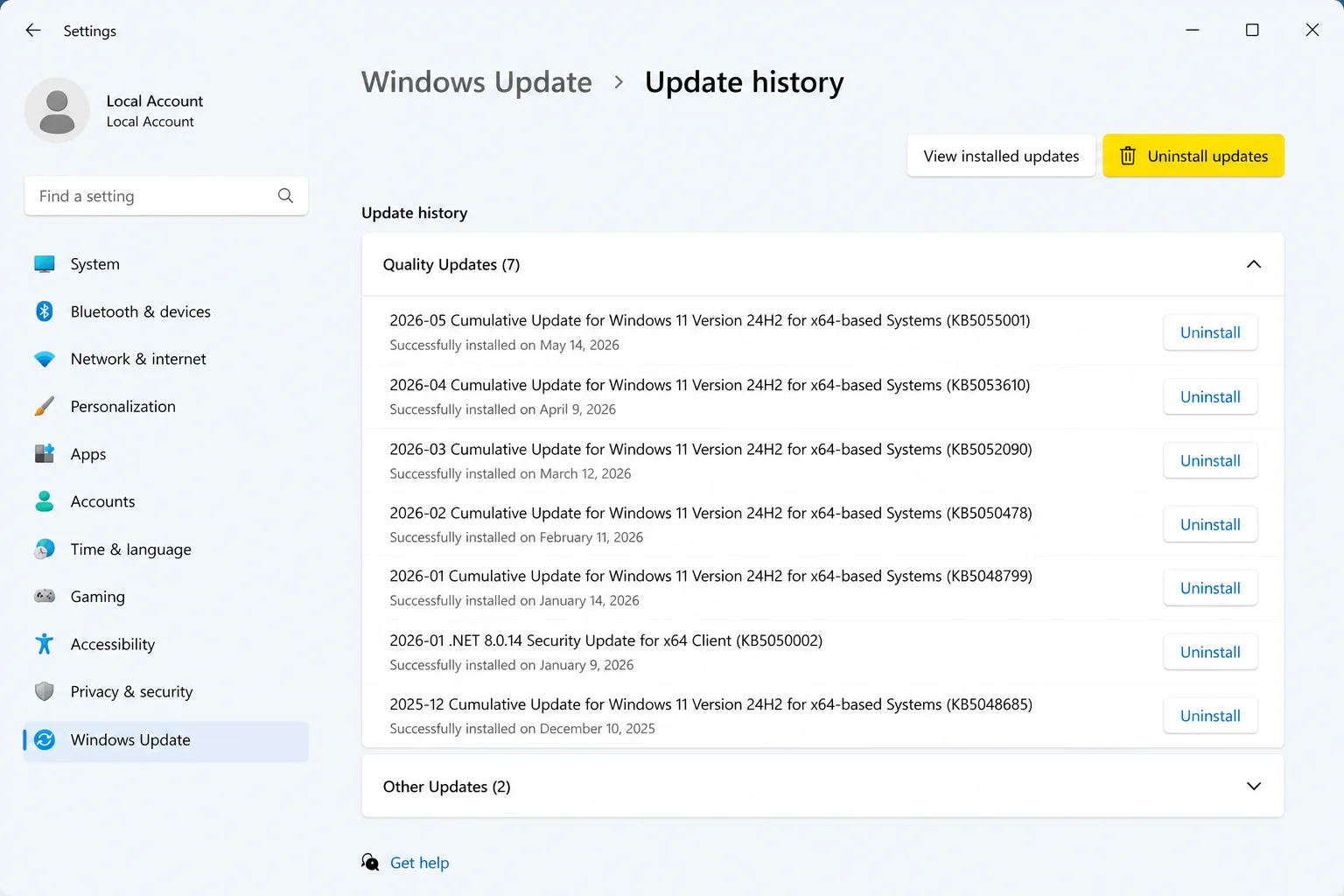 Windows 11 Settings > Windows Update > Update history with the "Uninstall updates" section showing a list of recent updates, each with an Uninstall button
