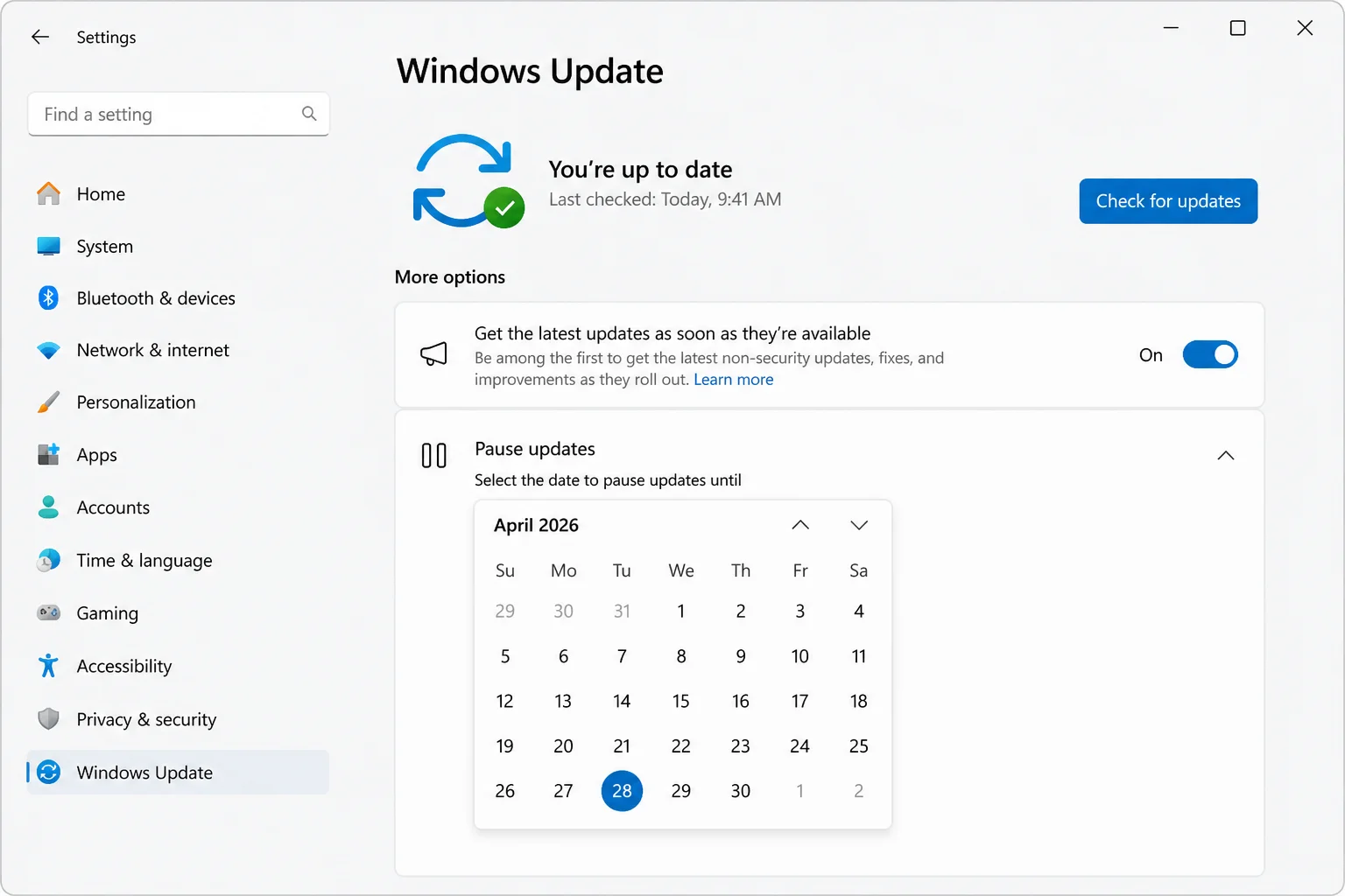 Windows 11 Windows Update Advanced options page showing the pause-until date picker control