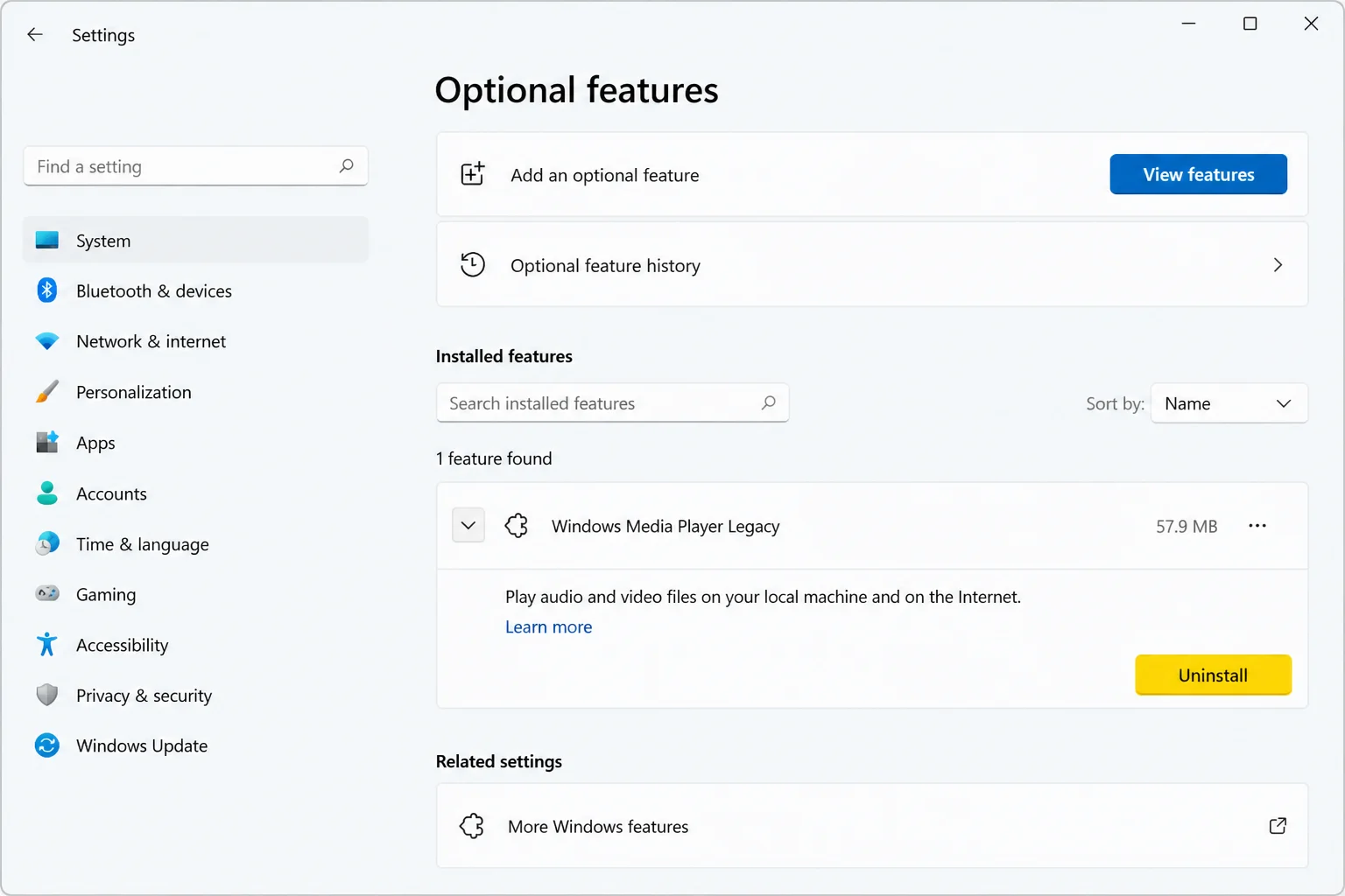 Windows 11 Optional features showing the installed Windows Media Player Legacy entry, expand control, and removal control