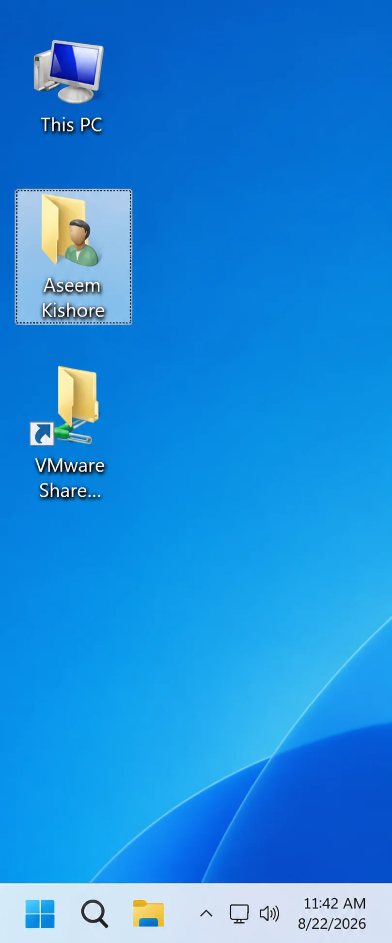 Windows desktop showing icons for Computer, Aseem Kishore, and VMware Share folders.