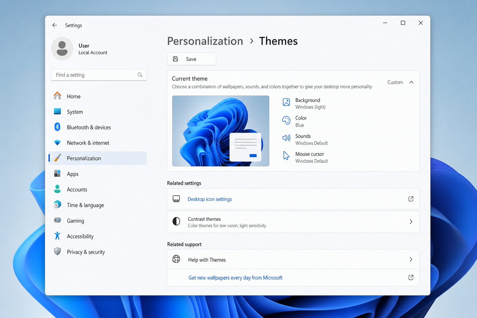 Windows 11 Settings > Personalization > Themes with "Desktop icon settings" link visible under Related settings