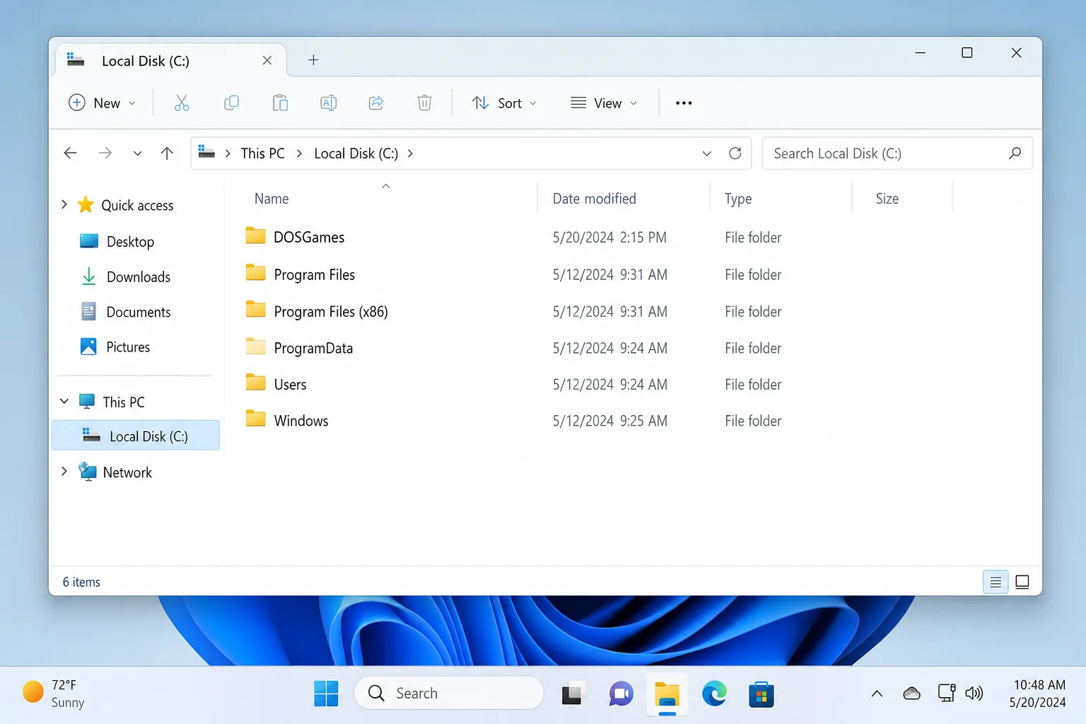 Windows 11 File Explorer showing C:\DOSGames folder created at the root of the C: drive