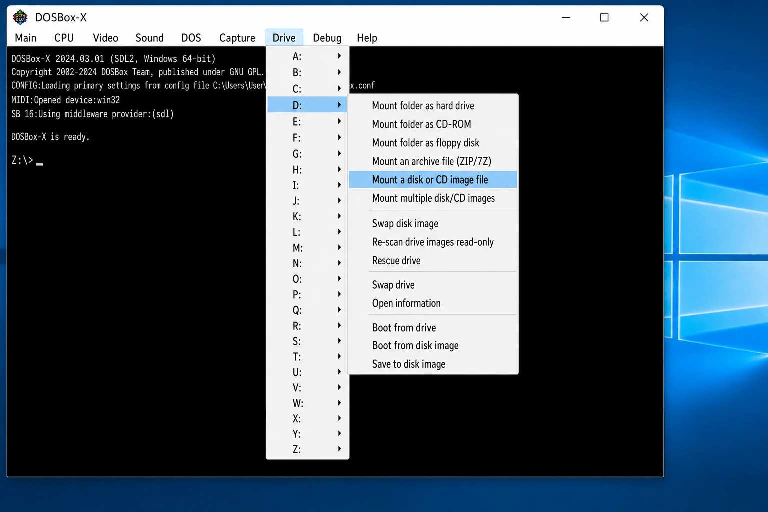 DOSBox-X Drive menu showing the D drive submenu with "Mount a disk or CD image file" option