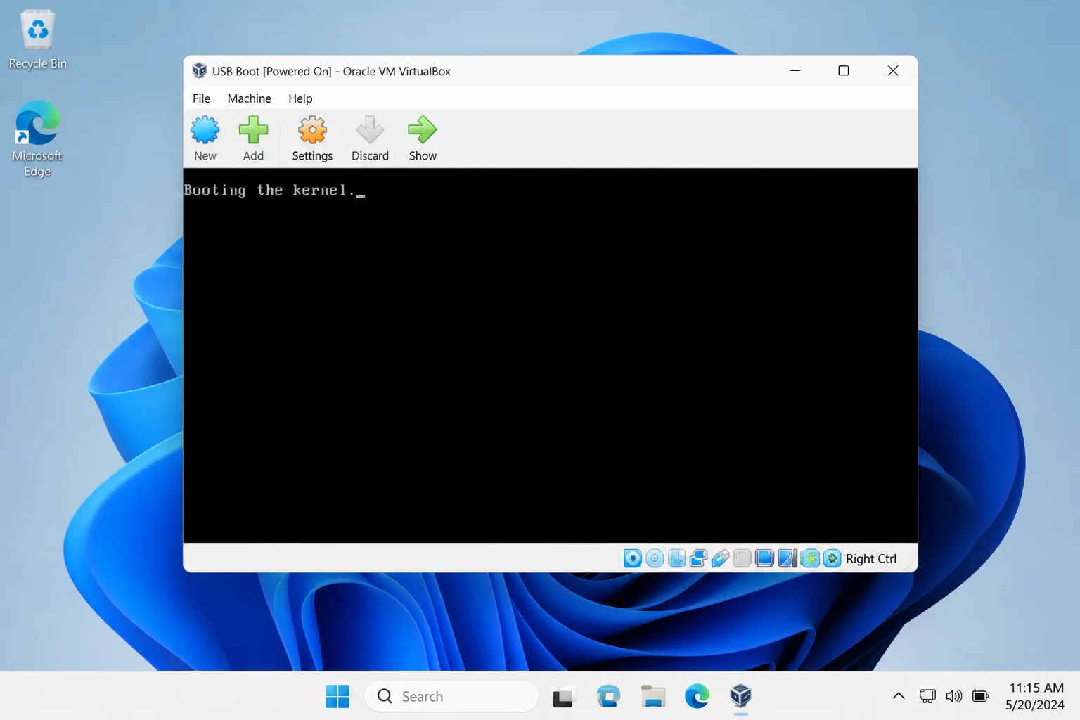 Running VirtualBox virtual machine displaying a bootable ISO startup screen inside the VM console