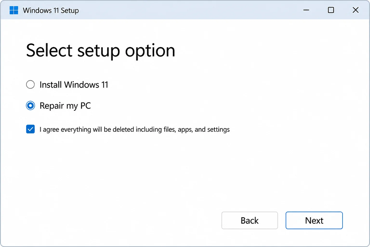 Windows 11 installation media setup screen with the repair computer option visible