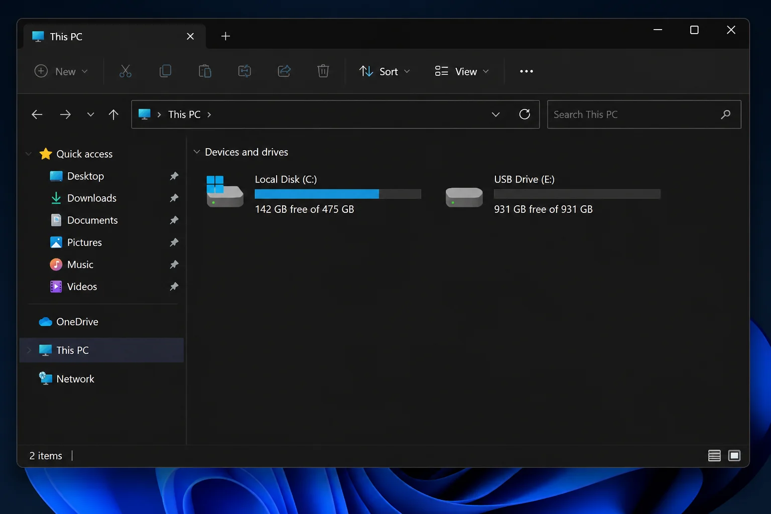Windows 11 File Explorer open to This PC with Local Disk (C:) and an external backup drive visible