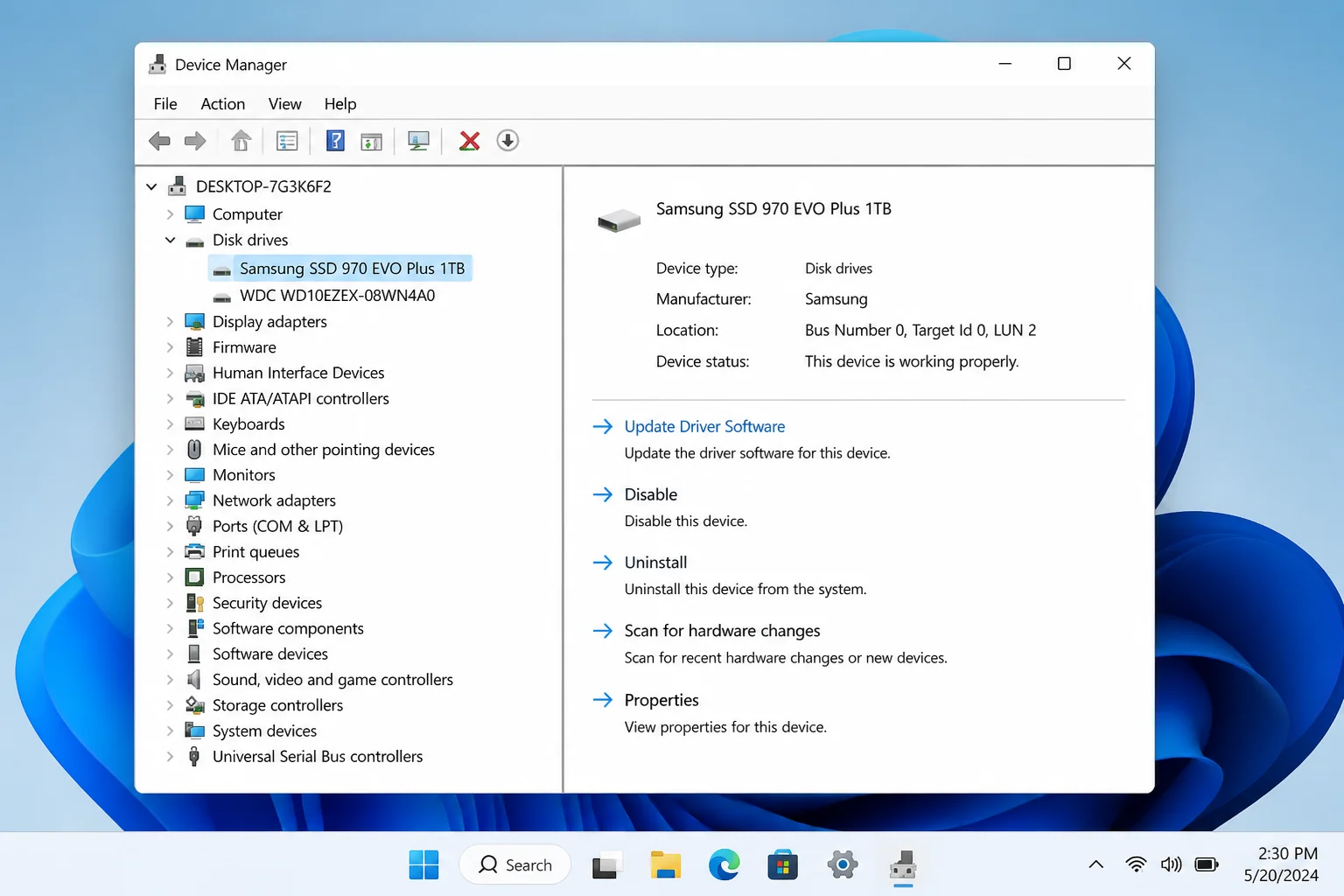 Windows 11 Device Manager with Disk drives expanded and the installed storage drive highlighted