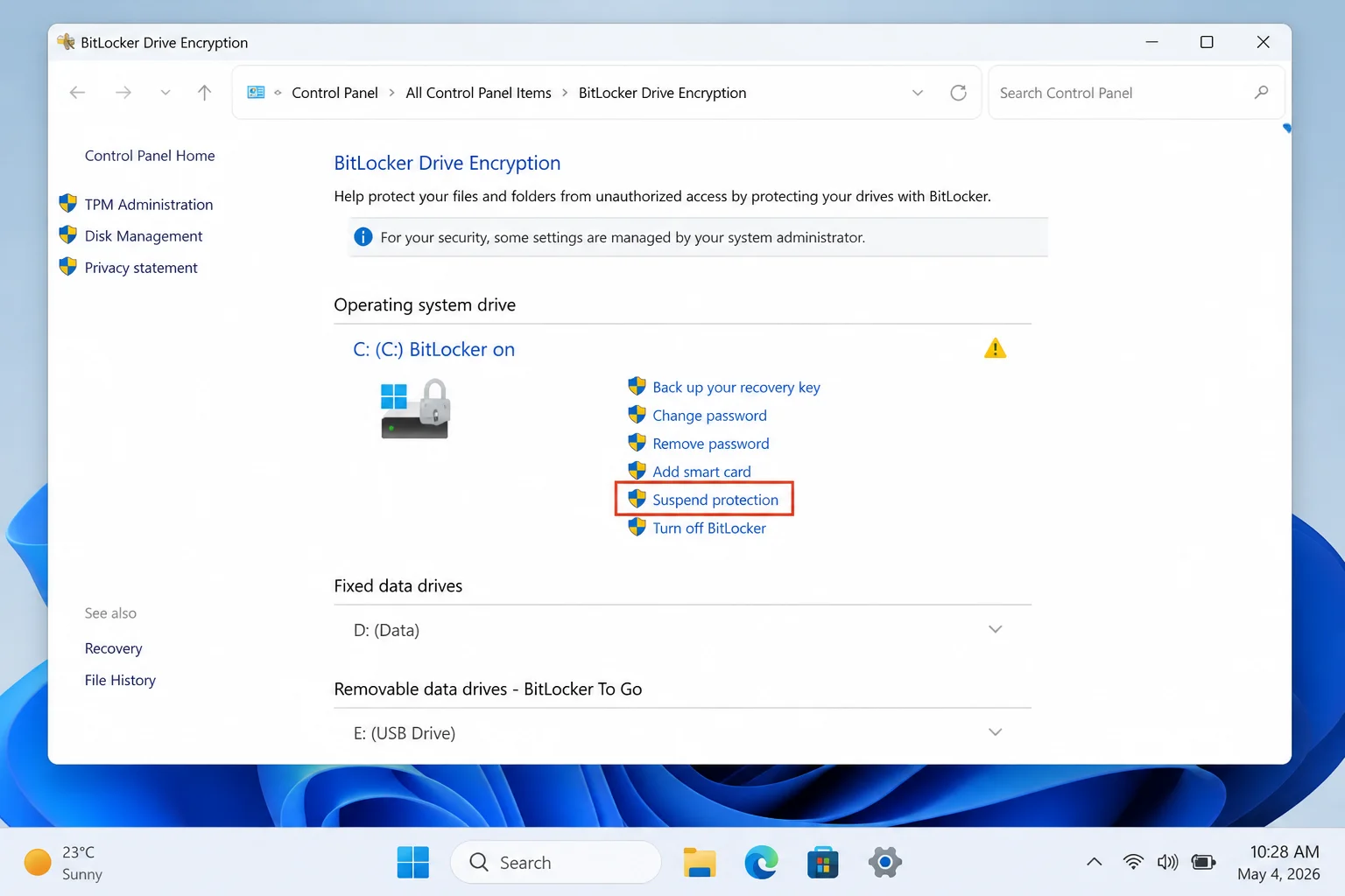 BitLocker Drive Encryption control panel with the Suspend protection link highlighted next to the C: drive