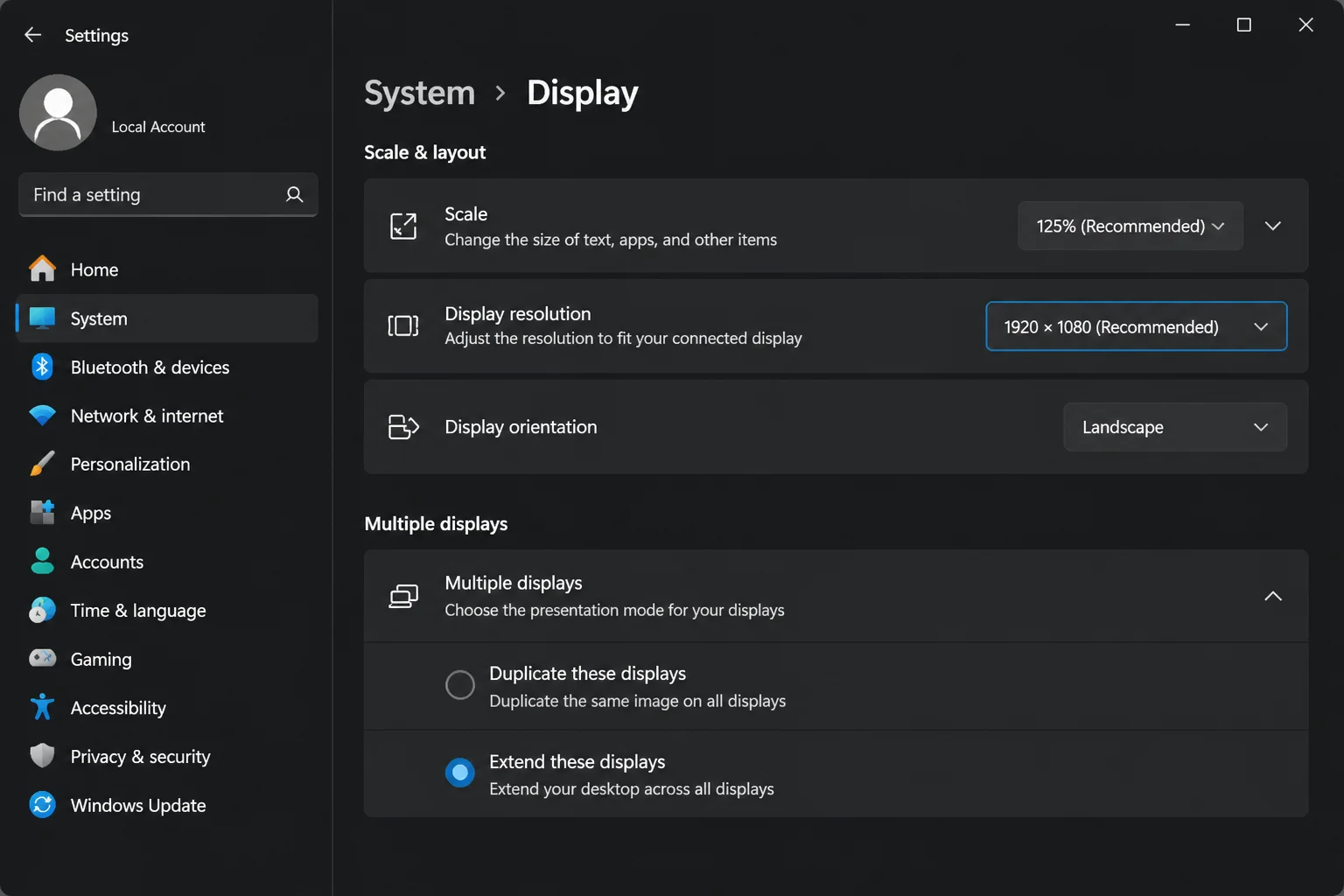 Windows 11 Settings > System > Display with the connected television and recommended display resolution visible