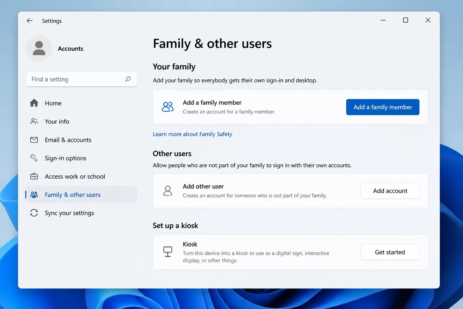 Windows 11 Settings > Accounts > Family showing the option to add a family member
